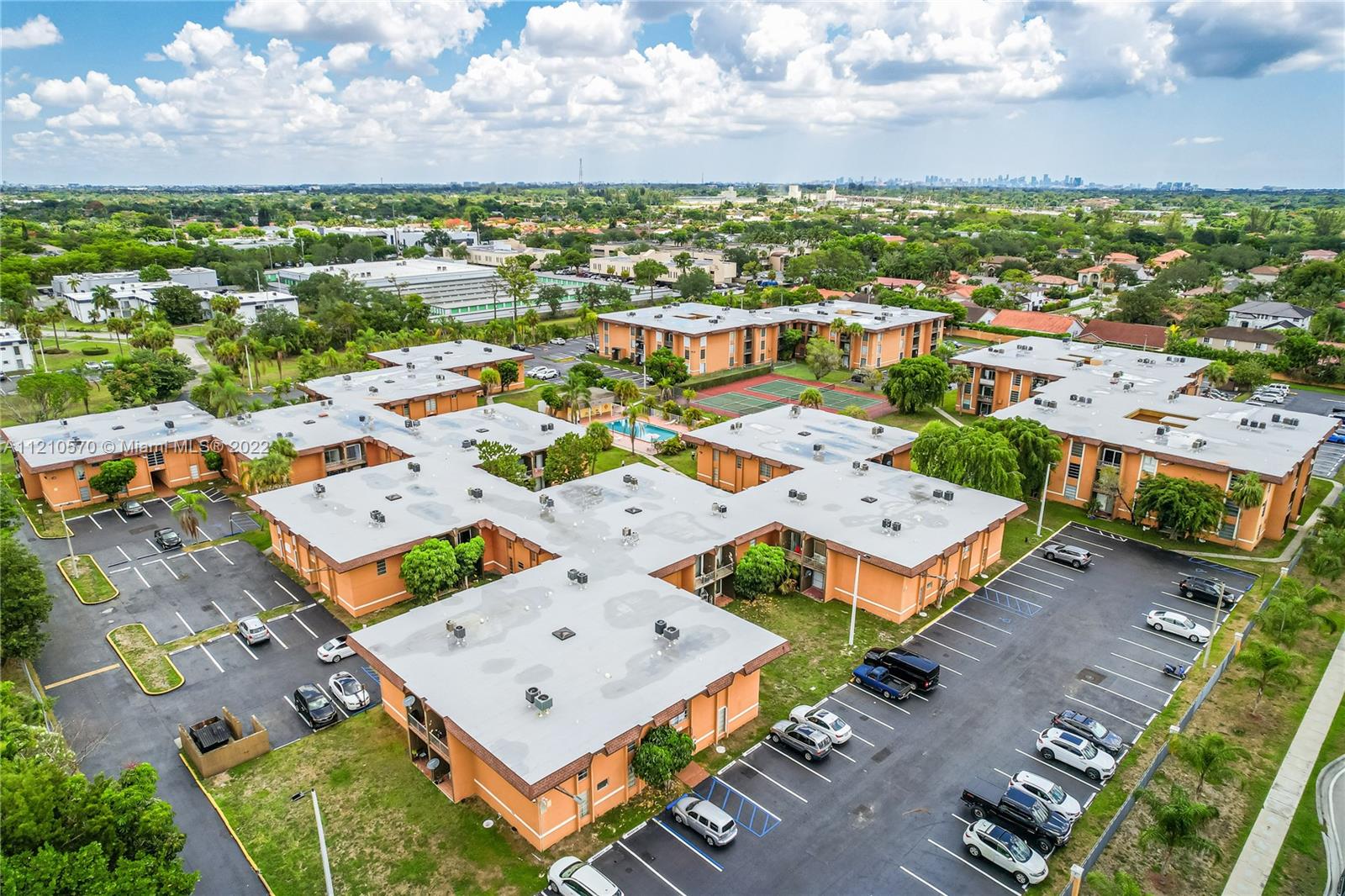 9459 Southwest 76th Street, Unit R7 Miami, FL 33173 - Photo 3 of 24 an aerial view of a houses with city view and lake view