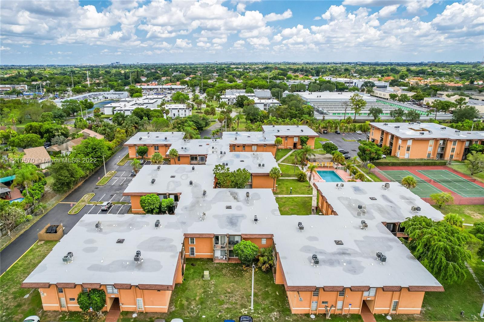 9459 Southwest 76th Street, Unit R7 Miami, FL 33173 - Photo 4 of 24 an aerial view of residential houses with outdoor space