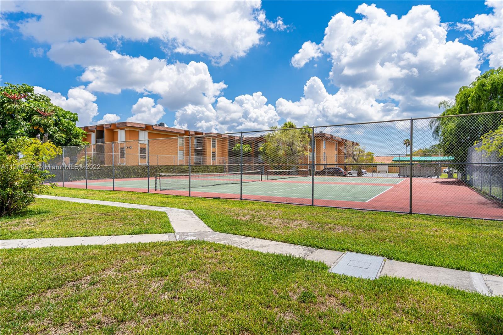 9459 Southwest 76th Street, Unit R7 Miami, FL 33173 - Photo 7 of 24 a view of a backyard