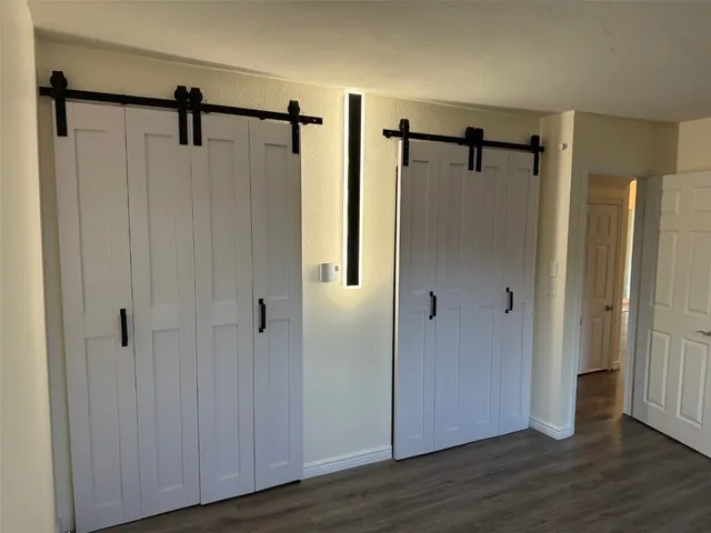 a view of bathroom with a shower and a tub