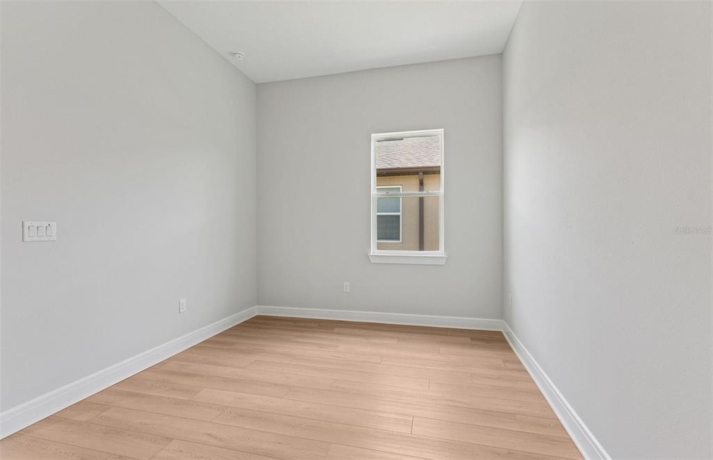 5230 Southwest 88th Circle Ocala, FL 34481 - Photo 12 of 35 an empty room with a window