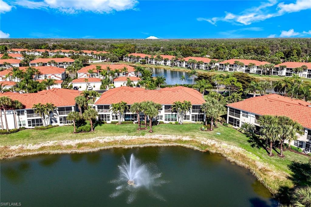 10921 Santa Margherita Road, Unit 103 Estero, FL 34135 - Photo 18 of 38 a view of lake and city