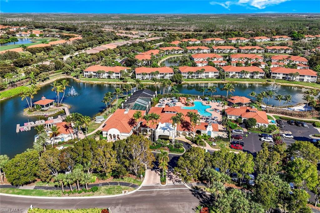 10921 Santa Margherita Road, Unit 103 Estero, FL 34135 - Photo 27 of 38 an aerial view of a houses with a lake view