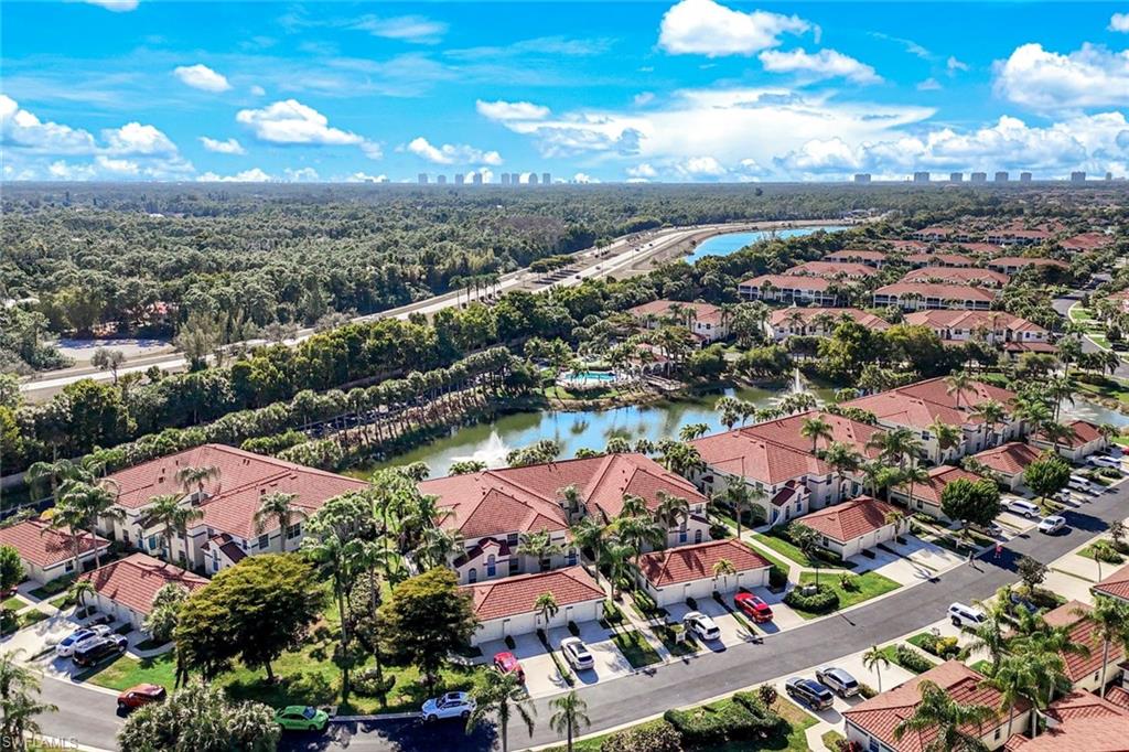 10921 Santa Margherita Road, Unit 103 Estero, FL 34135 - Photo 28 of 38 an aerial view of a city