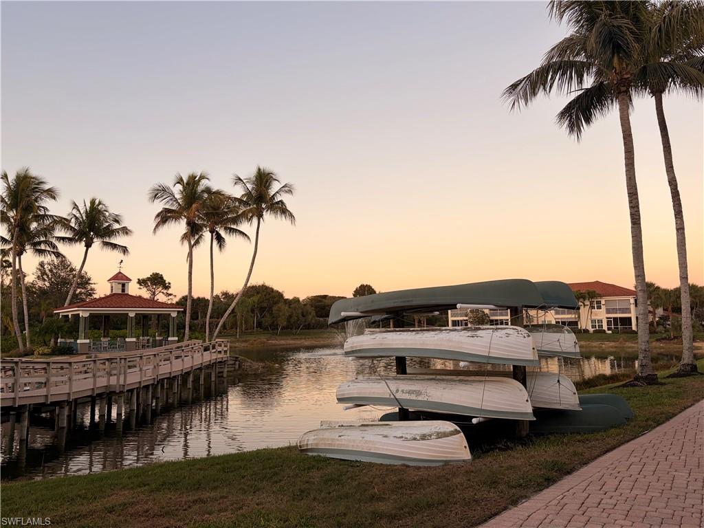 10921 Santa Margherita Road, Unit 103 Estero, FL 34135 - Photo 35 of 38 a view of houses with lake view
