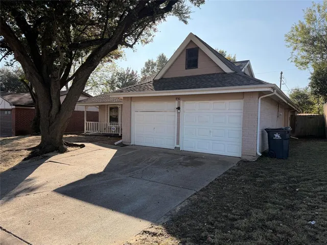 a backyard of a house with garage