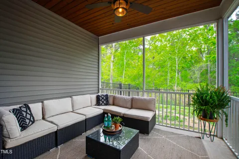 a outdoor living space with furniture and a potted plant