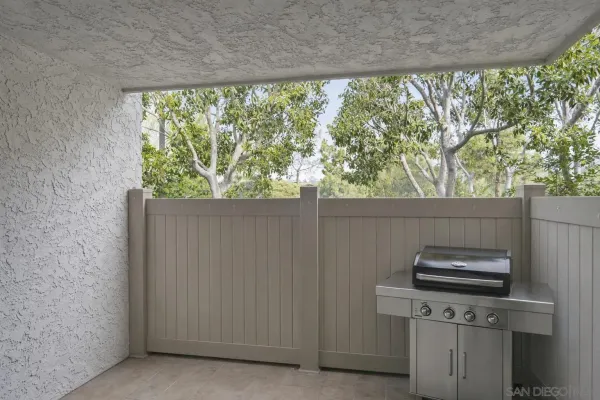 a kitchen with a stove and a fridge