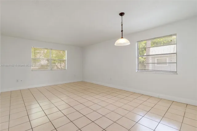 an empty room with windows