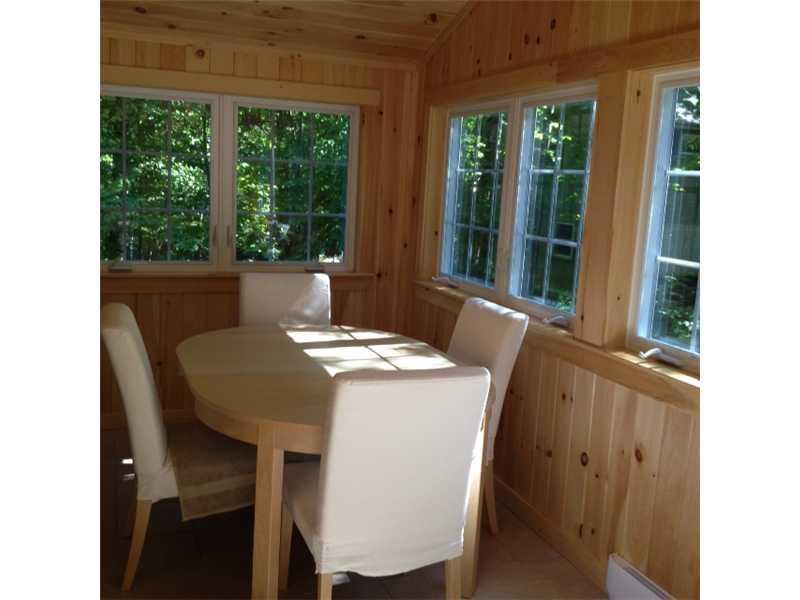 23 Fox Crossing Road Bridgton, ME 04009 - Photo 8 of 29 Patio/Deck. Year round porch with...