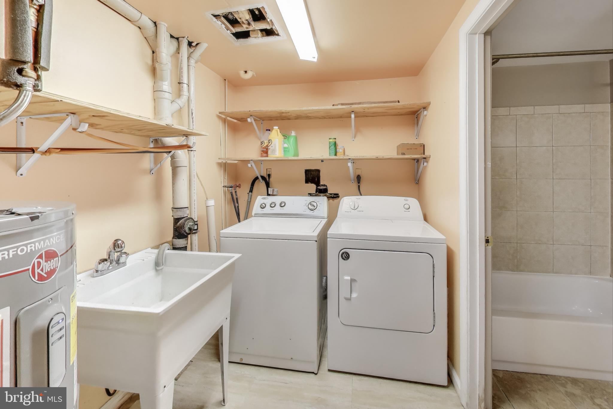 9217 Briarchip Street Laurel, MD 20708 - Photo 30 of 45 a utility room with dryer and washer