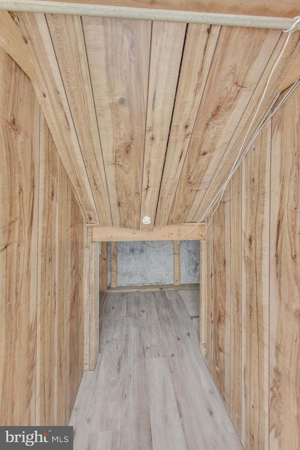 9217 Briarchip Street Laurel, MD 20708 - Photo 31 of 45 a view of entryway with wooden floor