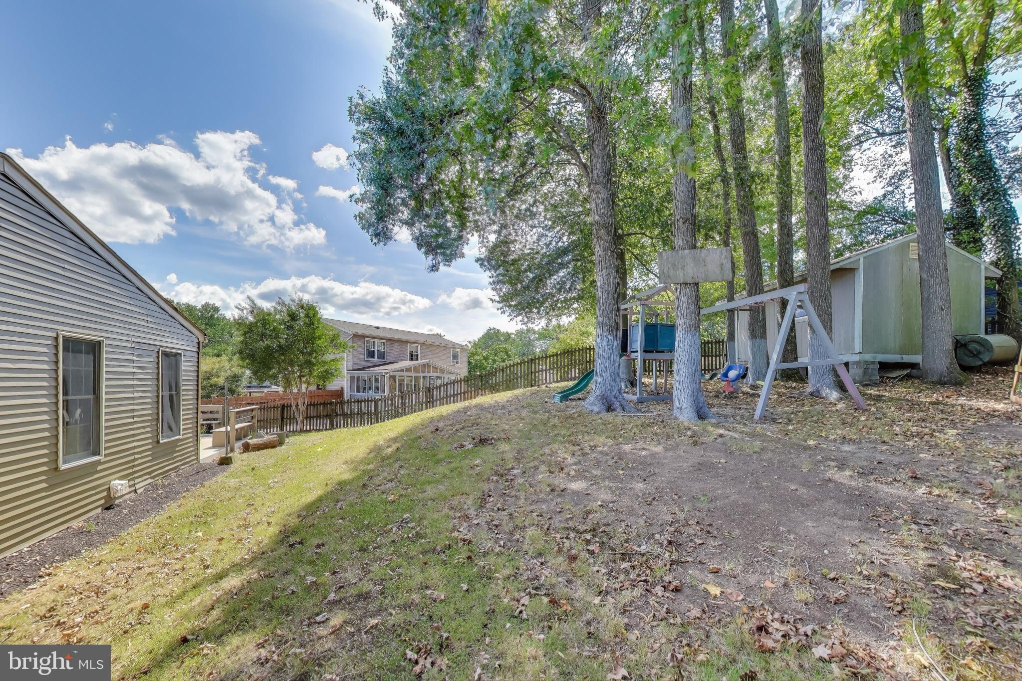 9217 Briarchip Street Laurel, MD 20708 - Photo 40 of 45 a view of a house with a yard