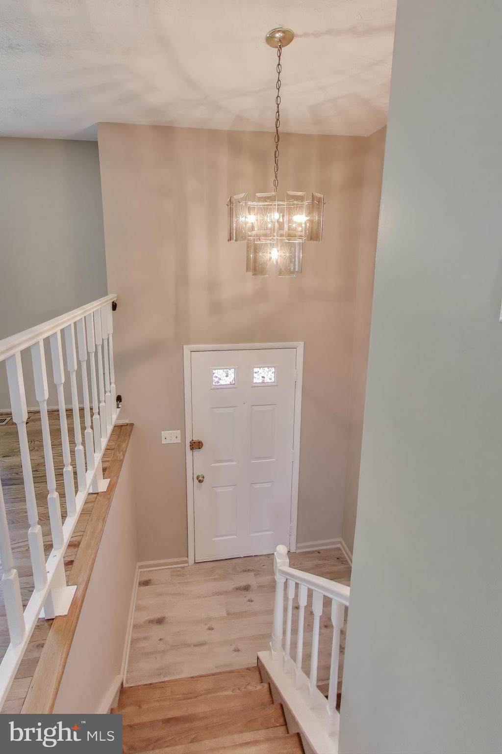 9217 Briarchip Street Laurel, MD 20708 - Photo 4 of 45 a view of a hallway view with staircase