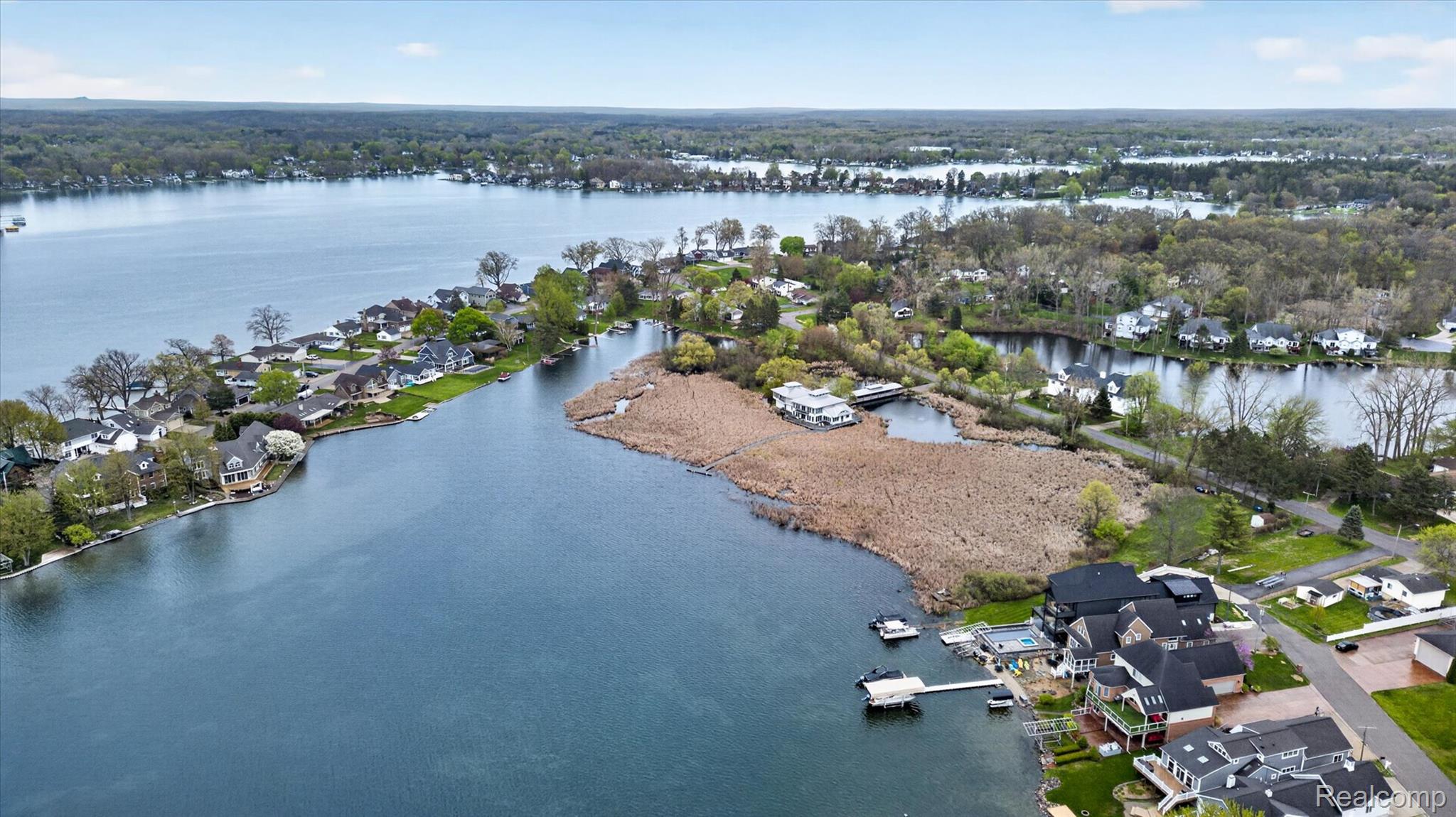 2264 Crane Road Fenton, MI 48430 - Photo 50 of 55 Aerial perspective of suburban area featuring a nearby body of water