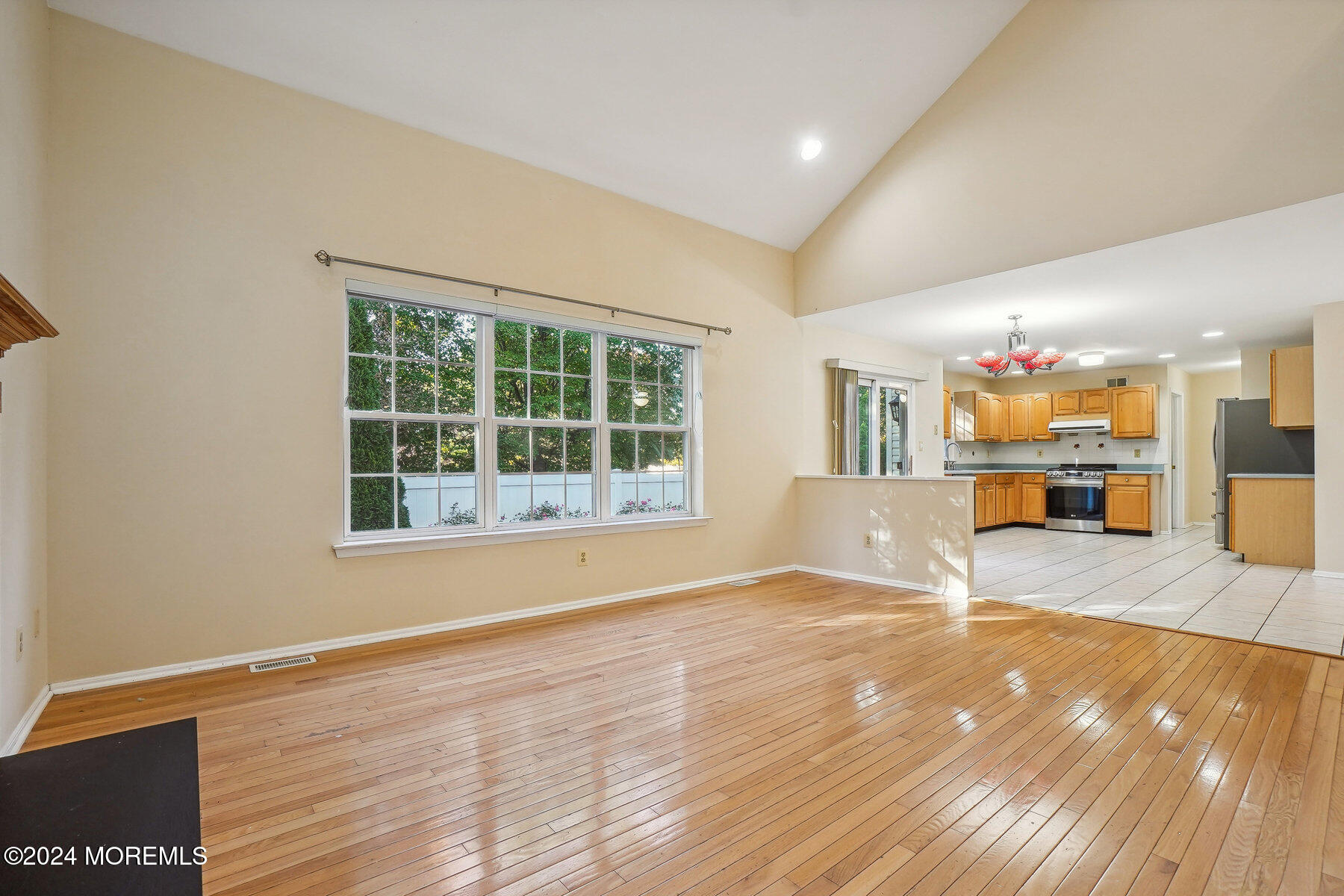 2 Stratton Road Matawan, NJ 07747 - Photo 11 of 34 a view of an empty room with wooden floor and a window