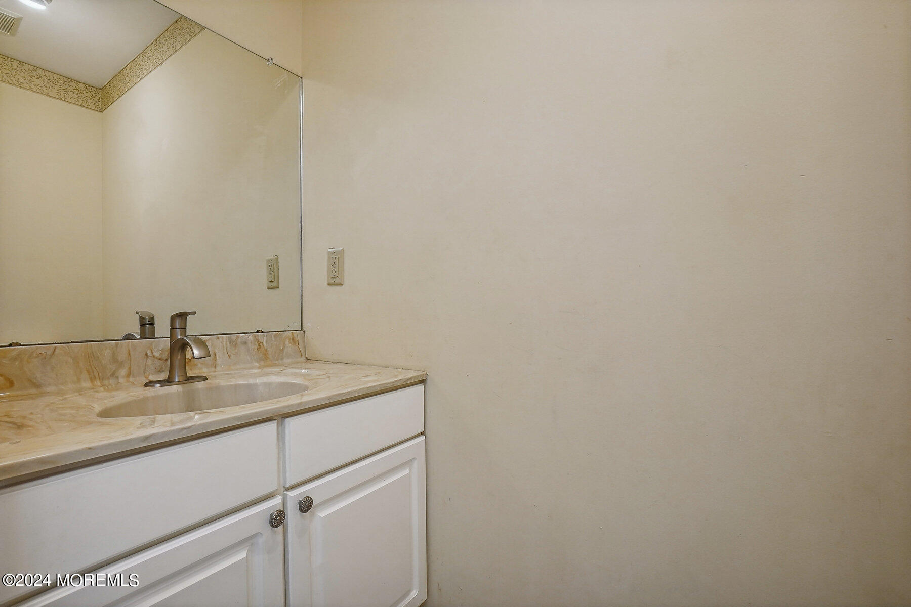 2 Stratton Road Matawan, NJ 07747 - Photo 15 of 34 a bathroom with a sink and vanity
