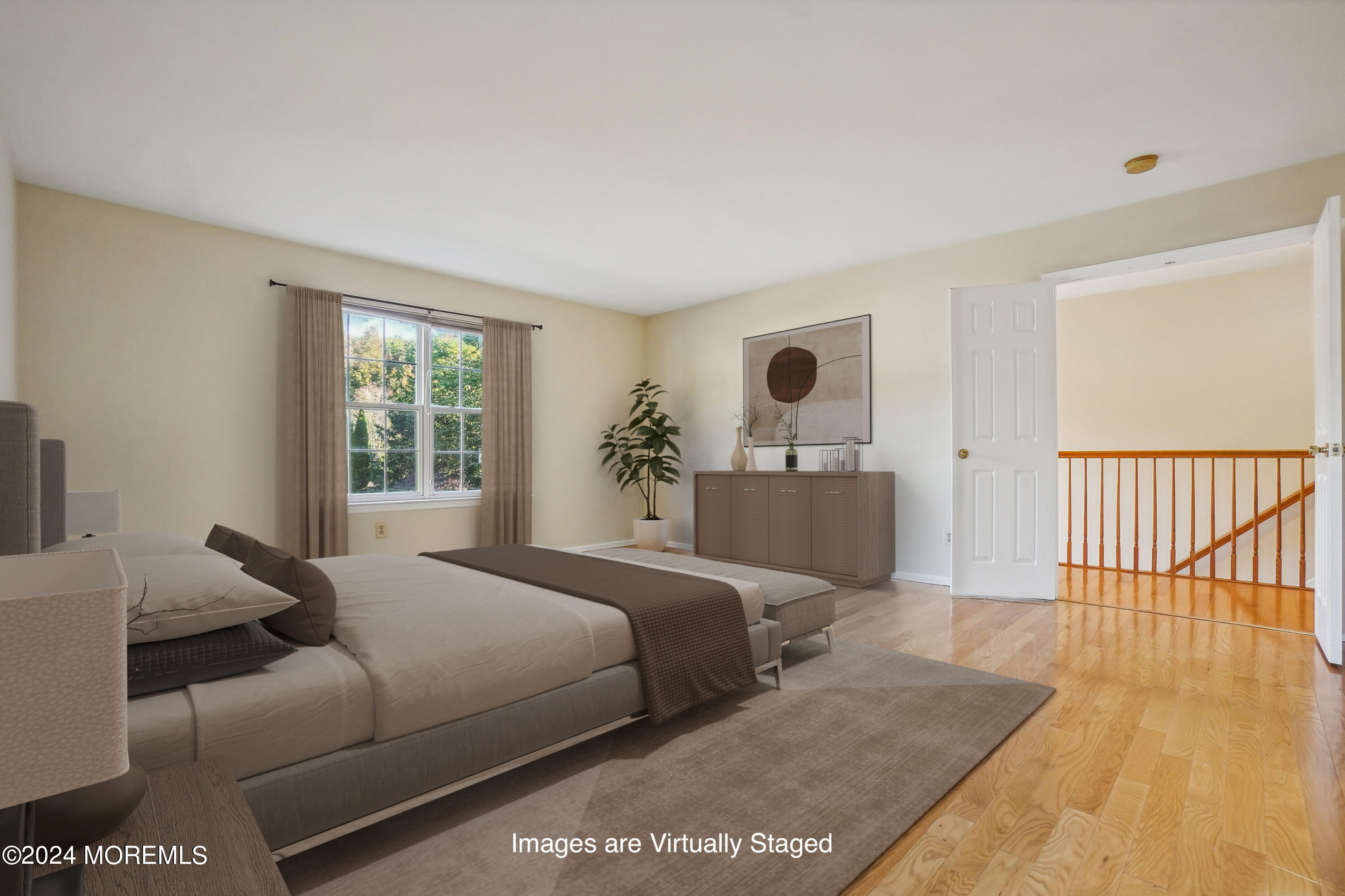 2 Stratton Road Matawan, NJ 07747 - Photo 17 of 34 a bedroom with a large bed and a window