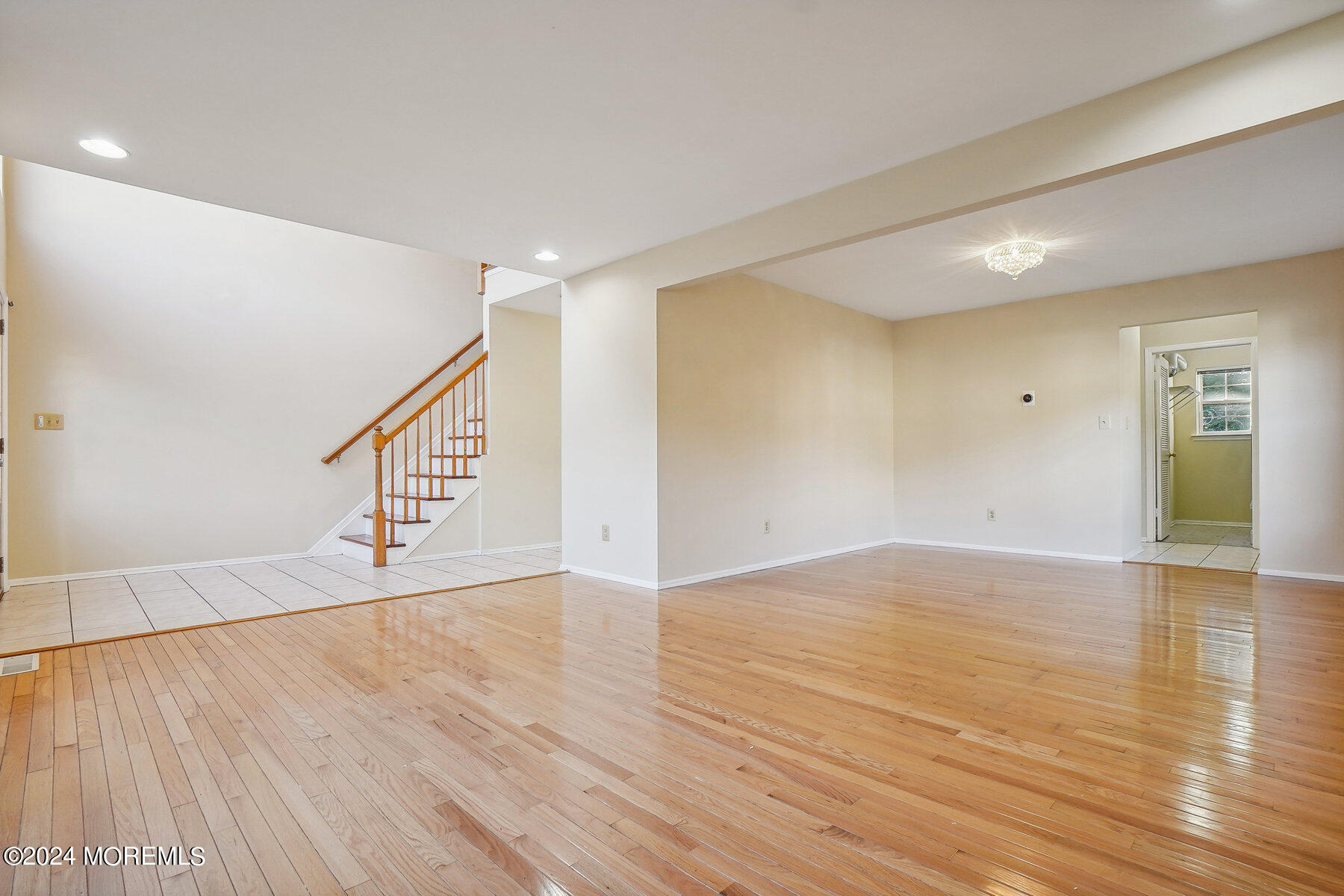2 Stratton Road Matawan, NJ 07747 - Photo 6 of 34 a view of an empty room with wooden floor