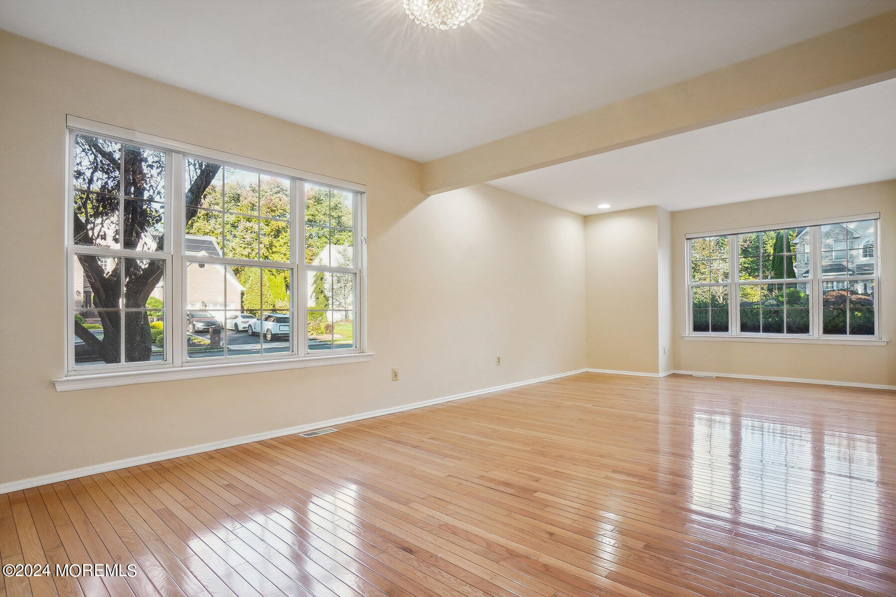 2 Stratton Road Matawan, NJ 07747 - Photo 8 of 34 a view of an empty room with wooden floor and a window