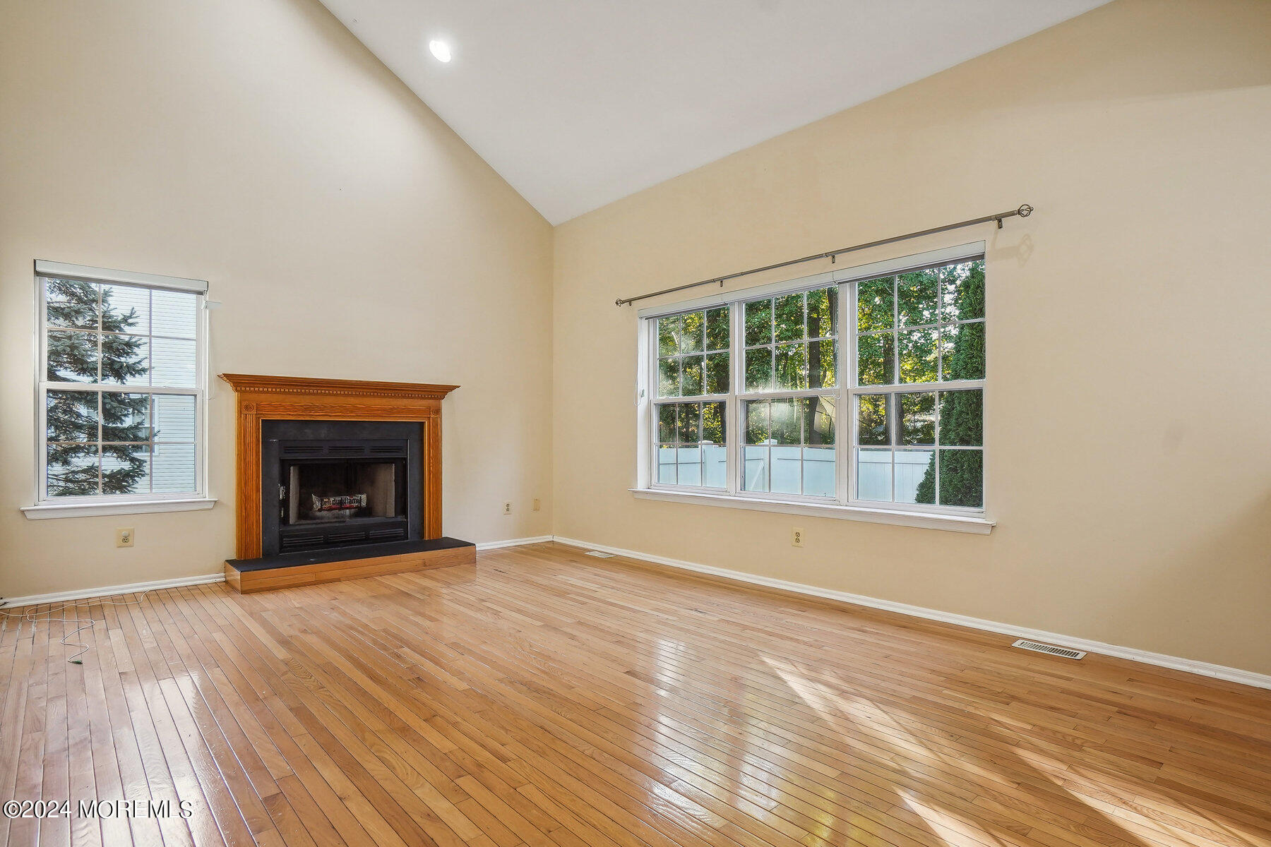 2 Stratton Road Matawan, NJ 07747 - Photo 9 of 34 a view of an empty room with window and fire place