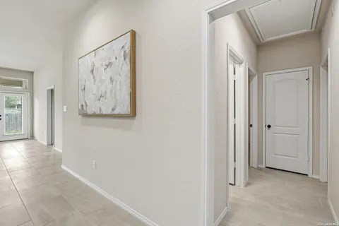 a view of a hallway with closet