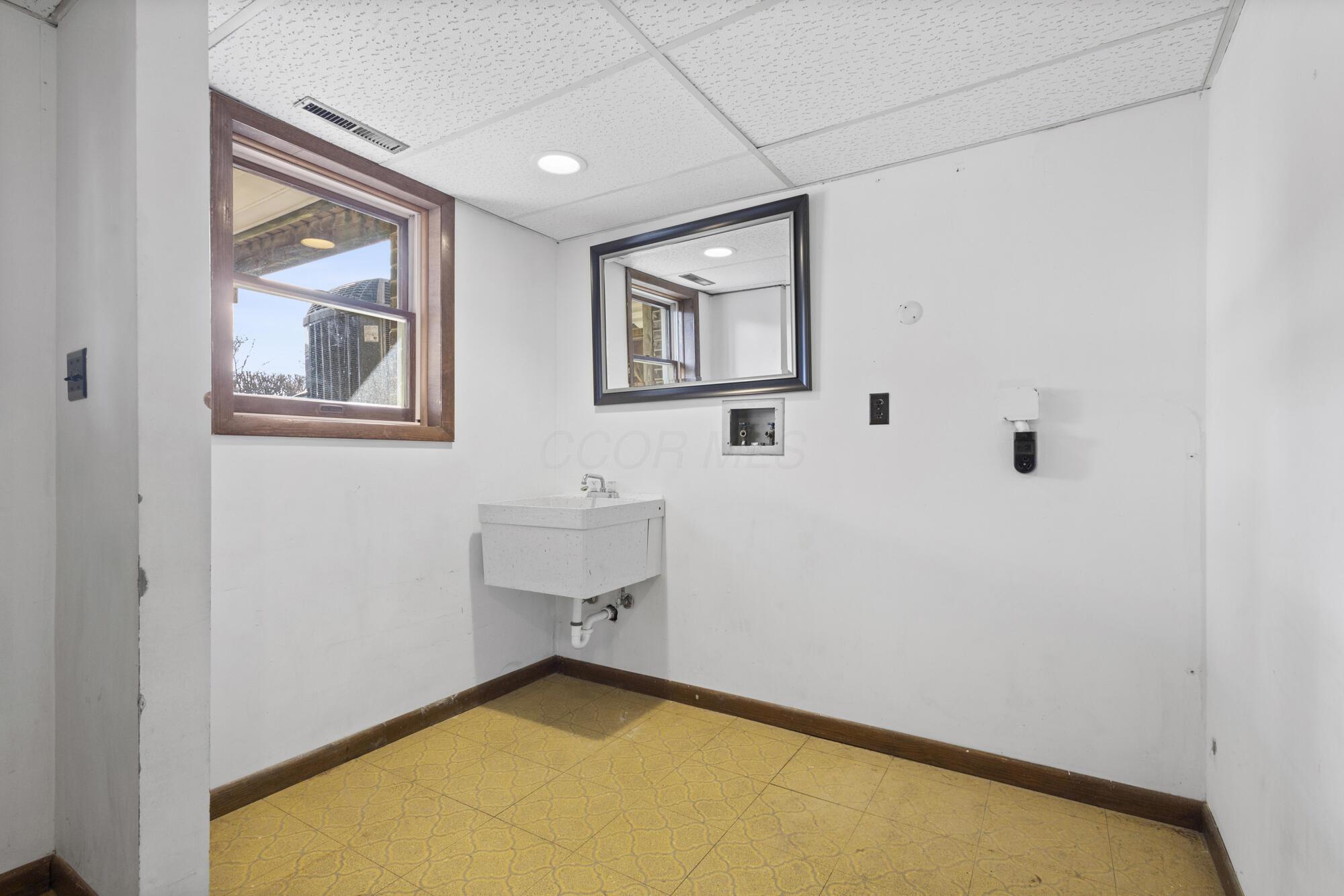 6650 Kilbourne Road Sunbury, OH 43074 - Photo 40 of 49 Lower-level laundry