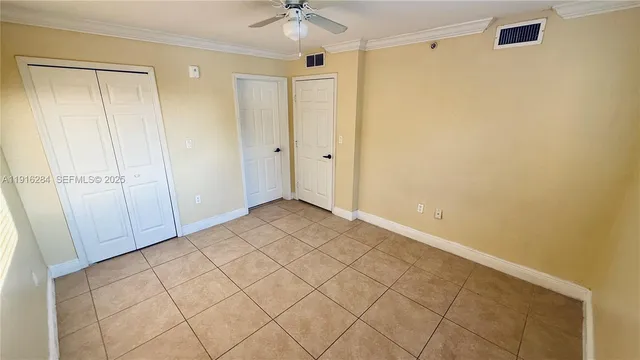 a kitchen with stainless steel appliances granite countertop a stove and a refrigerator