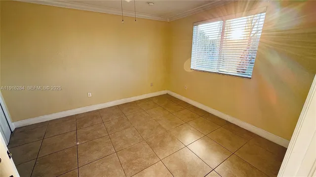 a view of a room with a window