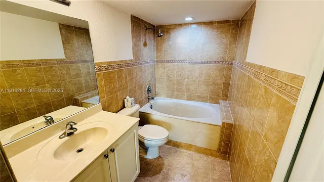 a bathroom with a sink and a bathtub