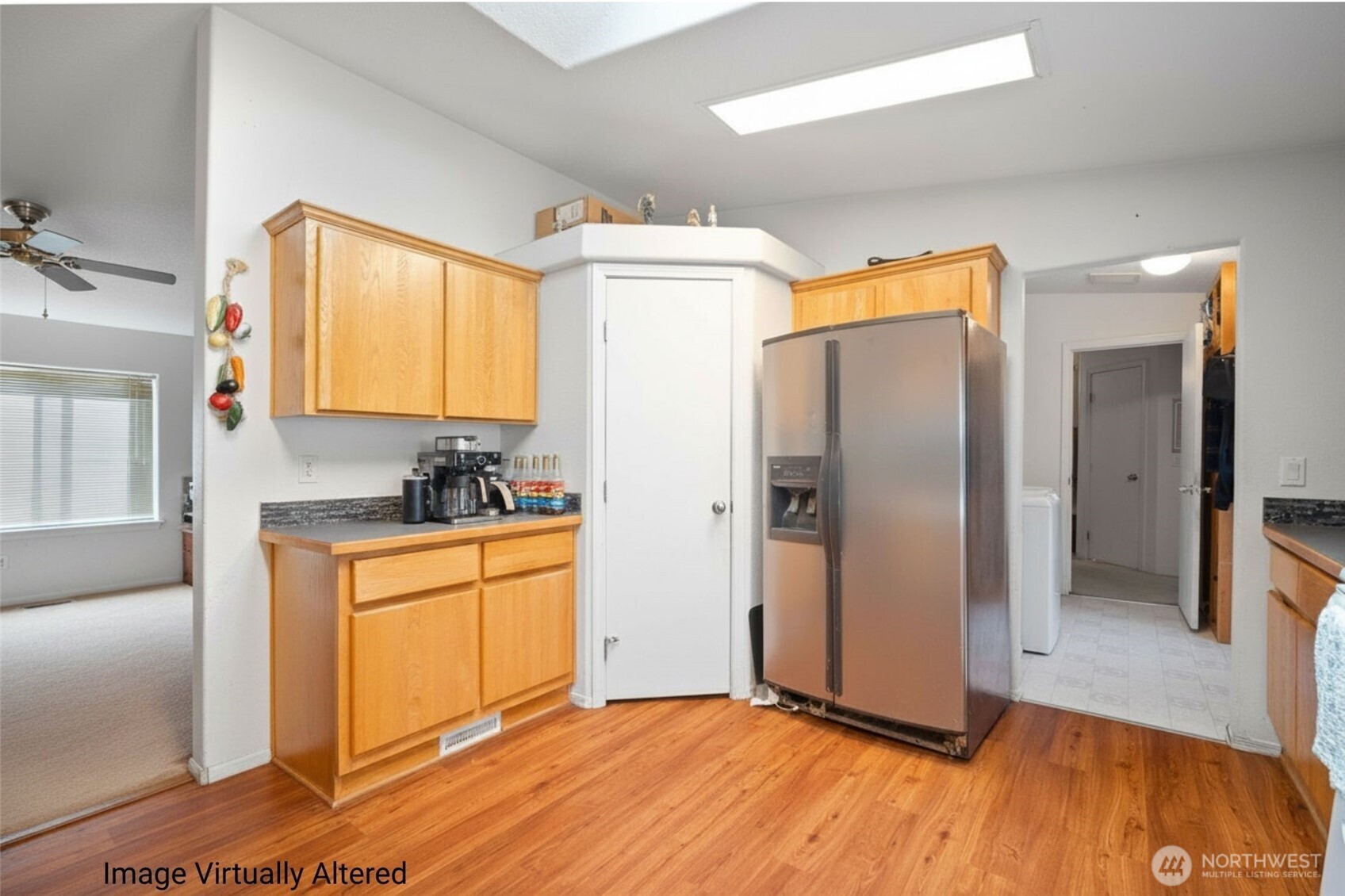 4230 Cody Road Blaine, WA 98230 - Photo 11 of 38 a kitchen with stainless steel appliances granite countertop a refrigerator and a sink