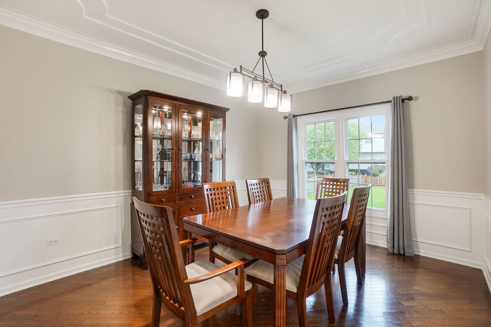 4775 Snapjack Circle Naperville, IL 60564 - Photo 13 of 55 a view of a dining room with furniture window and wooden floor