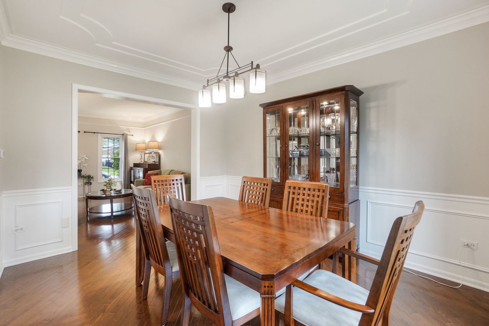 4775 Snapjack Circle Naperville, IL 60564 - Photo 15 of 55 a view of a dining room with furniture window and wooden floor