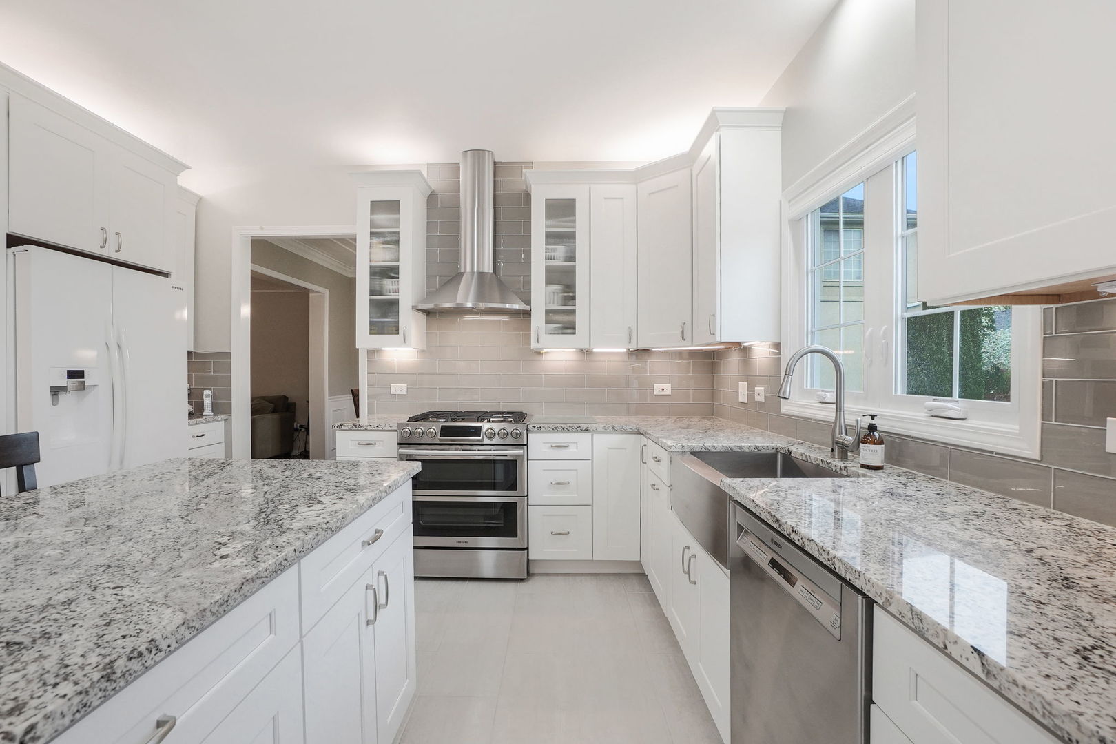 4775 Snapjack Circle Naperville, IL 60564 - Photo 18 of 55 a kitchen with stainless steel appliances granite countertop a sink stove and refrigerator