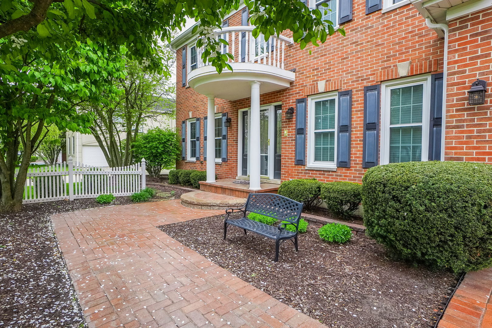 4775 Snapjack Circle Naperville, IL 60564 - Photo 2 of 55 a front view of a house with garden and patio
