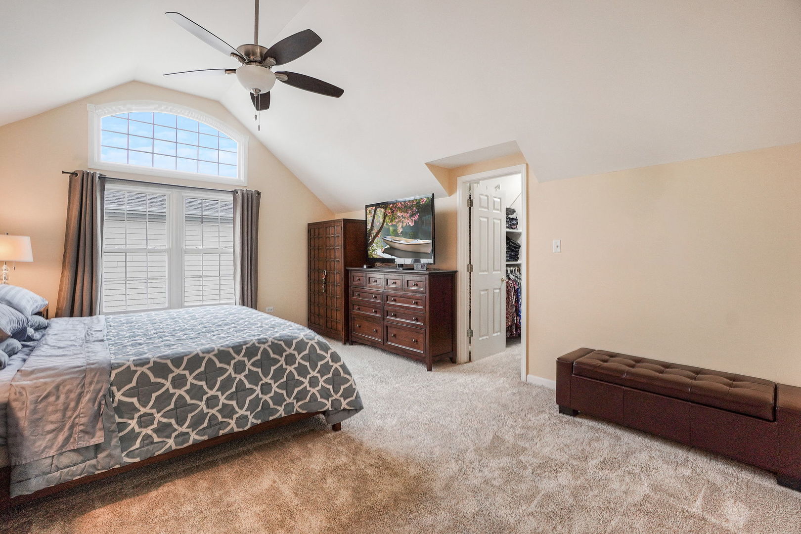 4775 Snapjack Circle Naperville, IL 60564 - Photo 28 of 55 a bedroom with a bed and a television