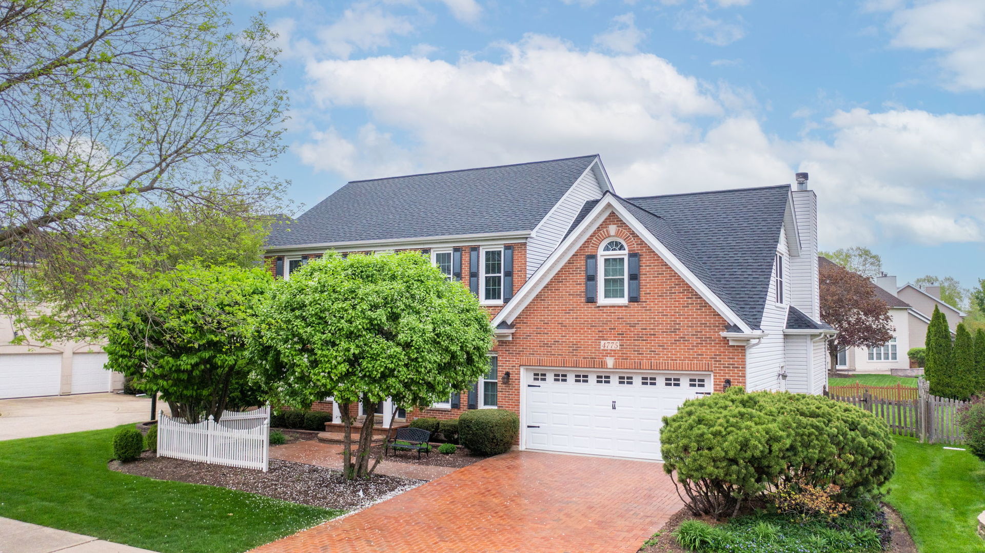 4775 Snapjack Circle Naperville, IL 60564 - Photo 3 of 55 a front view of a house with a yard