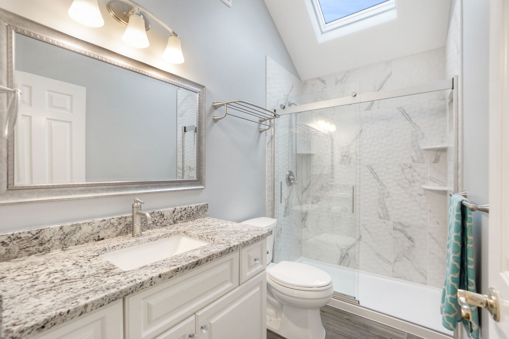 4775 Snapjack Circle Naperville, IL 60564 - Photo 37 of 55 a bathroom with a granite countertop sink toilet and shower