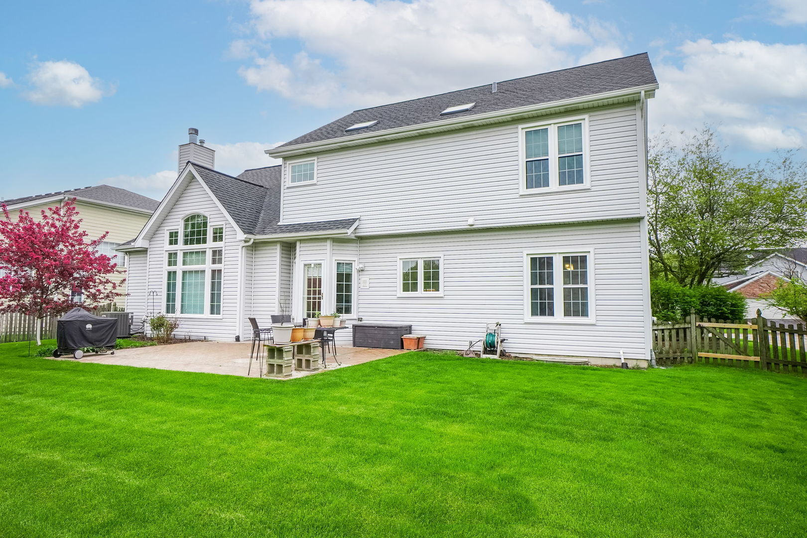 4775 Snapjack Circle Naperville, IL 60564 - Photo 45 of 55 a front view of a house with a yard and green space