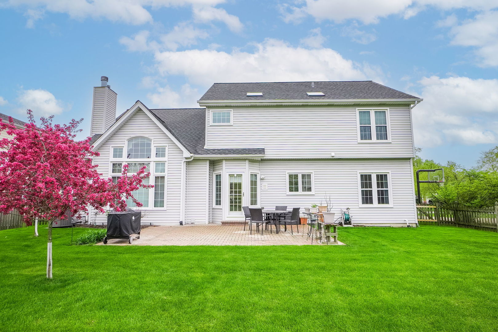 4775 Snapjack Circle Naperville, IL 60564 - Photo 46 of 55 a front view of a house with a garden and yard
