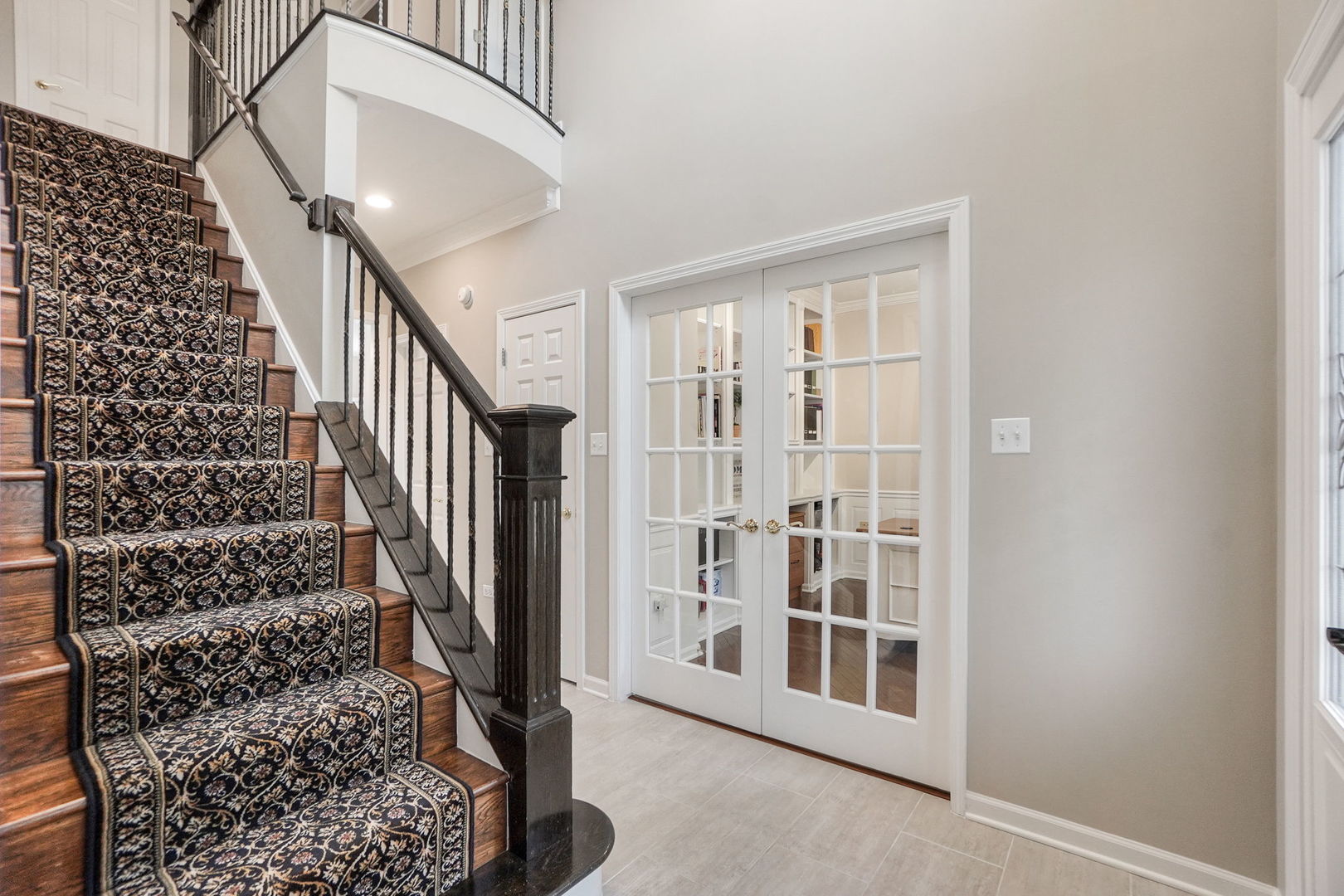 4775 Snapjack Circle Naperville, IL 60564 - Photo 9 of 55 a view of staircase with white walls and windows