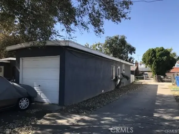 a view of a car in front of a house