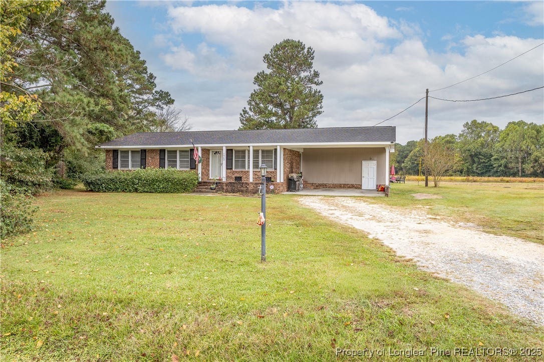 a house view with swimming pool and porch with furniture