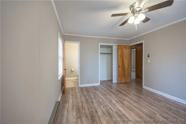 a bathroom with a sink a toilet and window