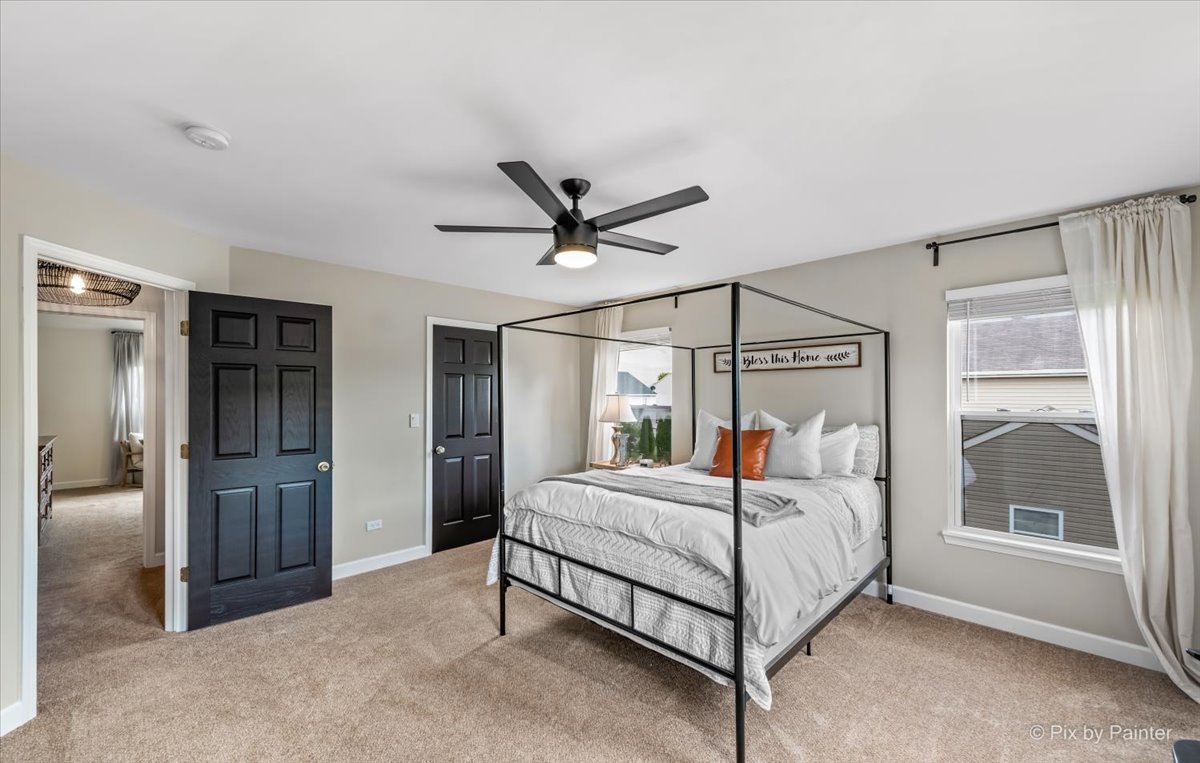 985 Kendall Street Elburn, IL 60119 - Photo 11 of 32 a bedroom with a bed and a large window