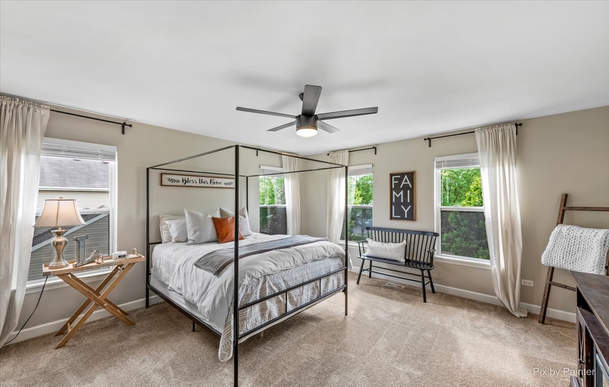 985 Kendall Street Elburn, IL 60119 - Photo 12 of 32 a bedroom with a bed and a window