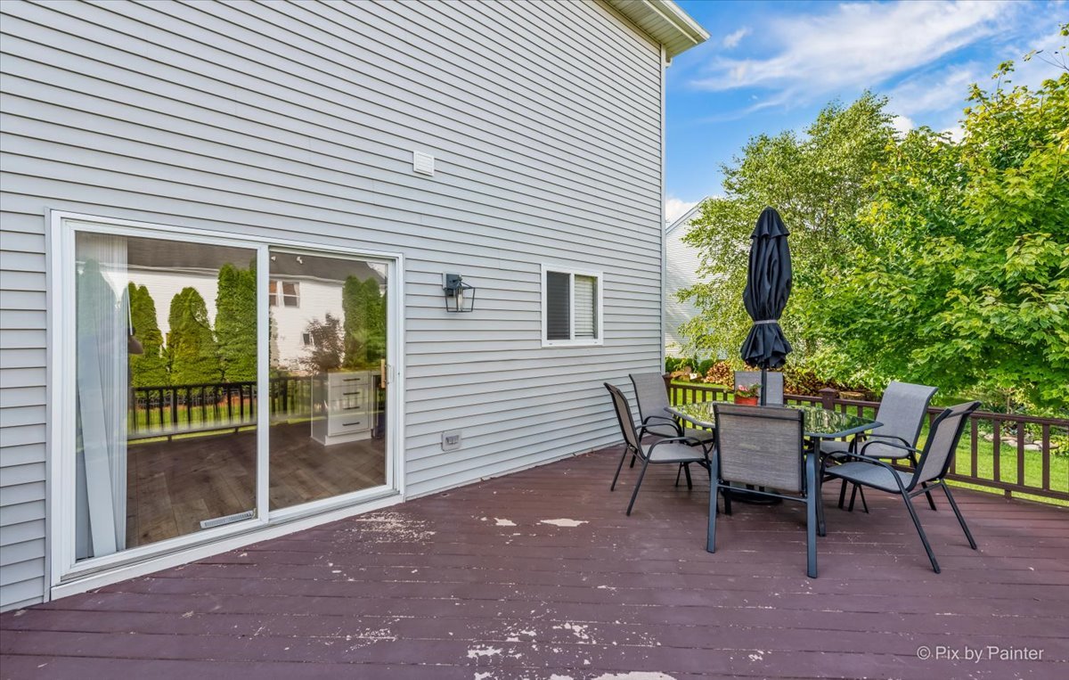 985 Kendall Street Elburn, IL 60119 - Photo 31 of 32 a view of a house with backyard and sitting area