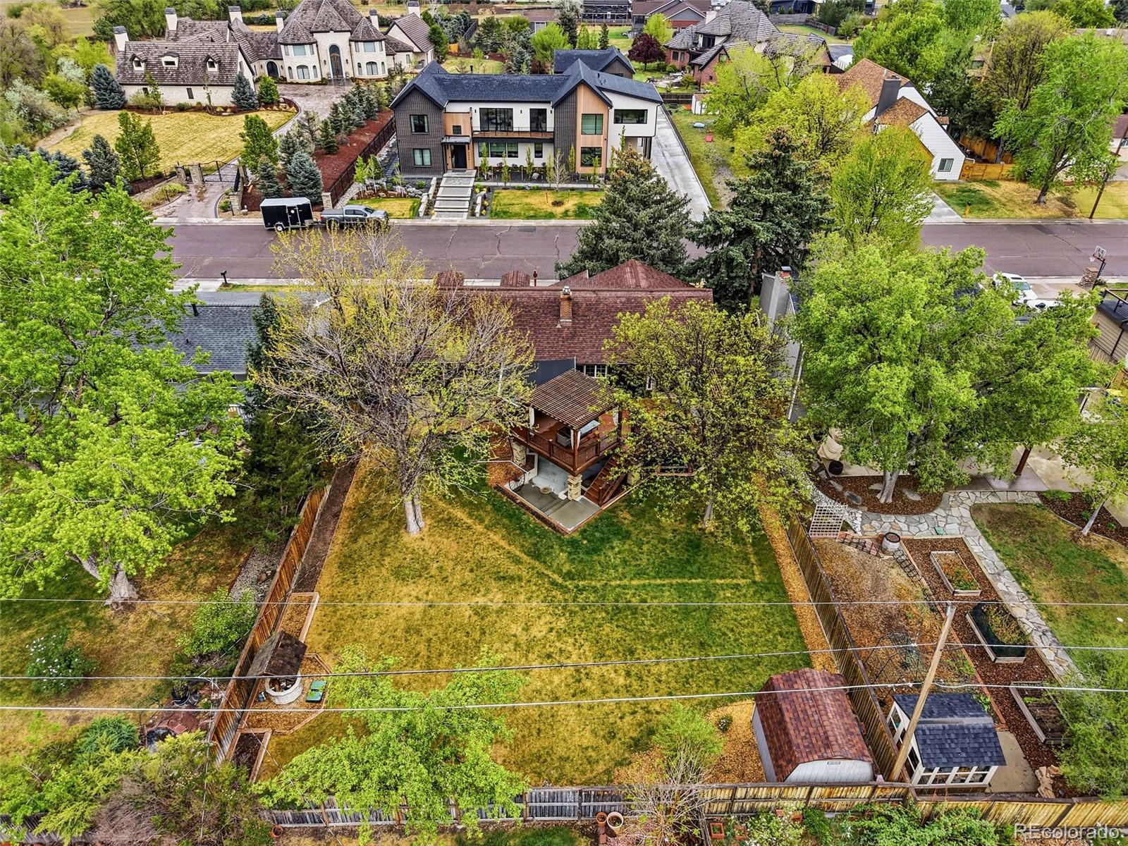 3393 Simms Street Wheat Ridge, CO 80033 - Photo 35 of 42 an aerial view of a house with a yard and swimming pool