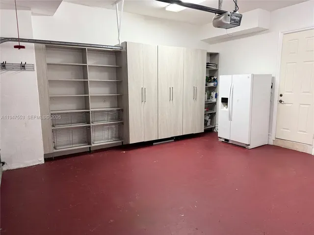 a view of room with an empty room and a window