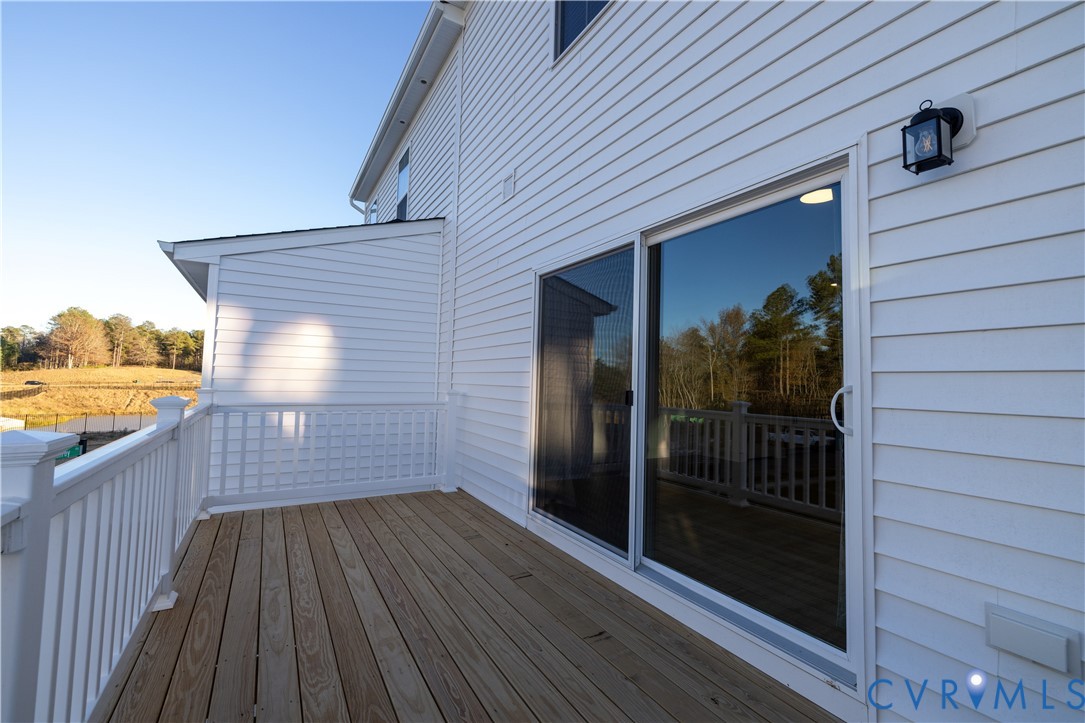 15309 Sunray Alley Chesterfield, VA 23832 - Photo 35 of 50 a view of a balcony with wooden floor